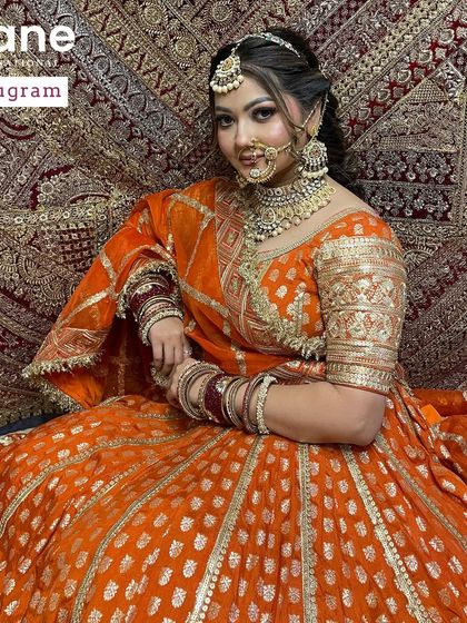 A full shot of a traditional orange bridal lehenga. I ensure my students get to practice a wide variety of classic and modern bridal styles during their course.