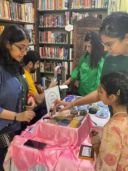 Interacting with a family at the Philo Fair. It's always wonderful to see children curious about natural products.