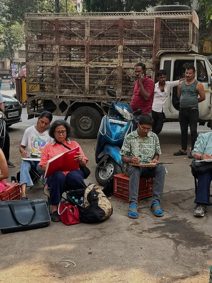 This is what on-location sketching looks like. We find a spot, get comfortable on our little stools, and immerse ourselves in the environment, capturing the world around us together.