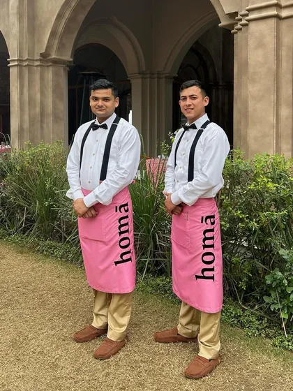 Meet the team that makes the magic happen. Our professional service staff, in their signature Homā uniforms, embody our philosophy of "white glove" service: present and attentive, yet never intrusive, ensuring your event runs flawlessly.