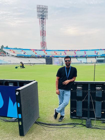 Flawsome. Leaning against the sideline screens at Eden Gardens during the World Cup. Embracing the imperfections and enjoying the journey.