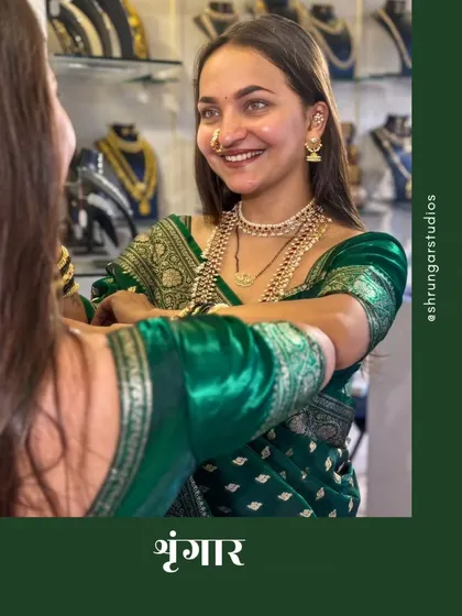 A candid moment showing the joy of wearing beautiful traditional jewellery.