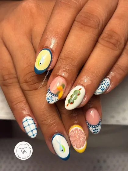 When a client brings me a fun, quirky idea, I'm always up for the challenge! This detailed, hand-painted nail art was inspired by a Mediterranean vacation, complete with tiny lemons and tile patterns.