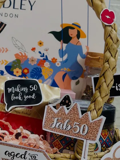 A close-up of the "Fab 50" cutout on the 50th birthday hamper, celebrating this golden milestone in style.
