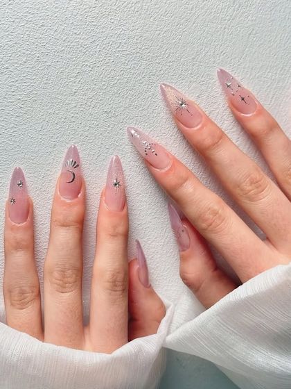 A full view of the celestial-themed nail inspiration, perfect for a dreamy look.