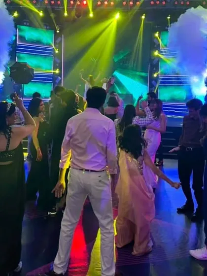 CO2 jets firing on the dance floor add a huge burst of energy. It's a fantastic special effect for making a sangeet or reception feel like a major concert.