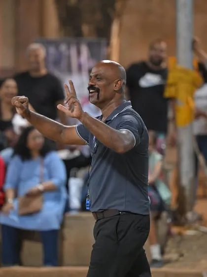 One of our senior referees, Gopi Sir, making a call during a game. His energy and smile are legendary on our courts.