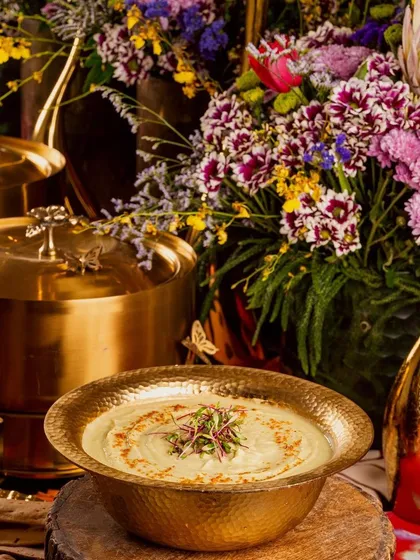 The rich colors of our food and serveware complement the vibrant decor, creating a cohesive and luxurious atmosphere for any celebration.