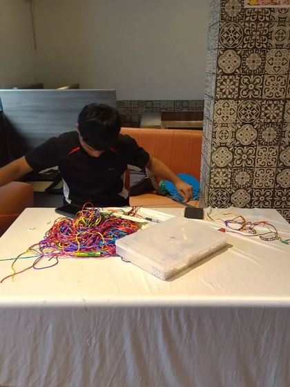 This is our bracelet-making station, where kids can get creative and make their own party favors to take home.