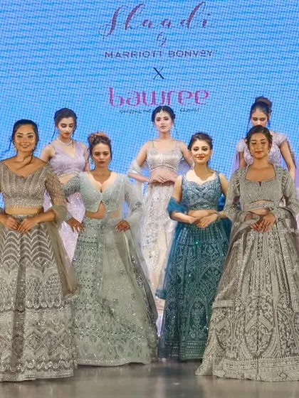 Another beautifully composed group shot from the Marriott event, showcasing a different arrangement of models and outfits.