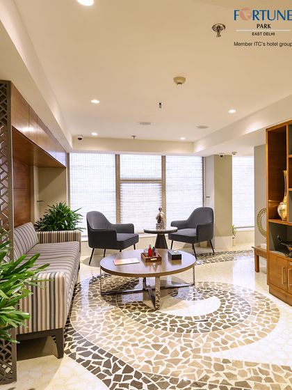 The spa lounge features unique mosaic flooring and comfortable seating, creating an elegant and welcoming first impression as you begin your wellness experience.