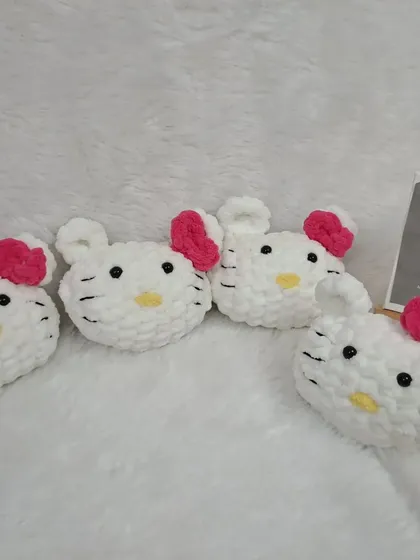 These Hello Kitty amigurumi heads are perfect as small toys or can be turned into keychains. They are made with soft, plush yarn.