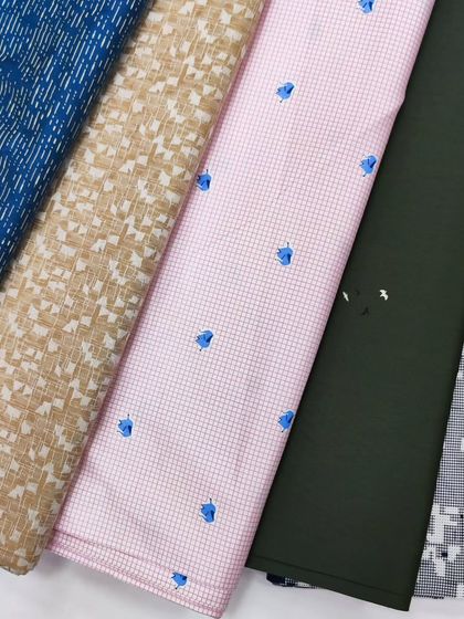 A variety of beautiful printed fabrics perfect for custom-tailoring everyday formal or semi-formal shirts.