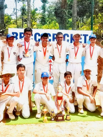 The victorious City Gymkhana U16 team posing with their medals and trophy after winning the RRCC tournament.