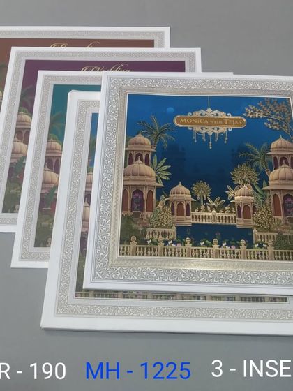 A bright blue invitation featuring a grand palace scene under a chandelier. This three-insert set is perfect for a glamorous and royal wedding celebration.