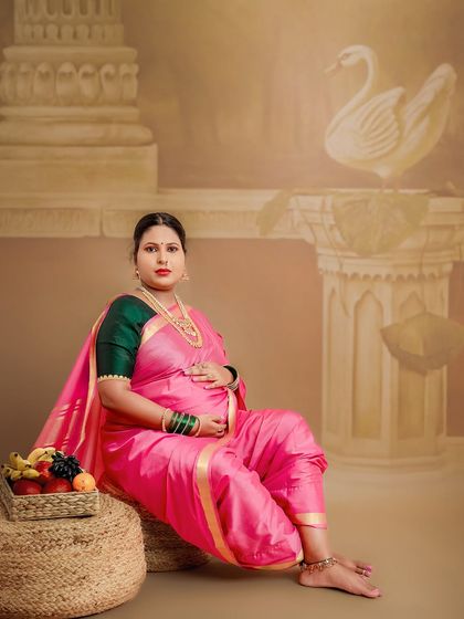 A slightly different angle of the classic traditional portrait, this image captures the mother-to-be's direct and graceful gaze.
