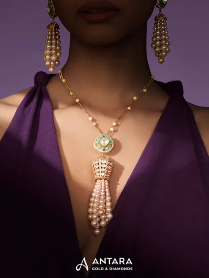 This exquisite necklace is serene, sculptural, and frames the face in quiet opulence. I designed it with a pendant of uncut Polkis leading to a tassel of South Sea pearls, a truly unique piece.