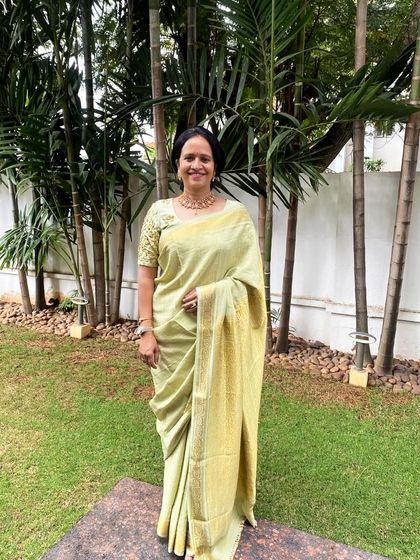 Our client Swetha acing the monochrome look in her Mysore silk saree and a bespoke hand-embroidered blouse in a lovely pistachio green.