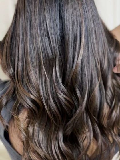 A detailed shot of the hair, showing the fine highlights and glossy finish.