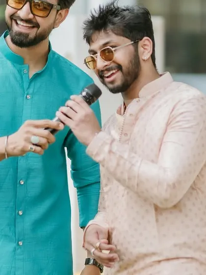 Passing the mic to a guest to share a joke or a song. My events are about participation, not just observation.