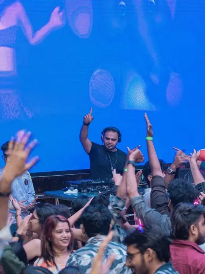 Commanding the stage with a huge LED screen as my backdrop. As a VDJ, I use visuals to tell a story and amplify the emotions of the music, creating a powerful connection with the audience.