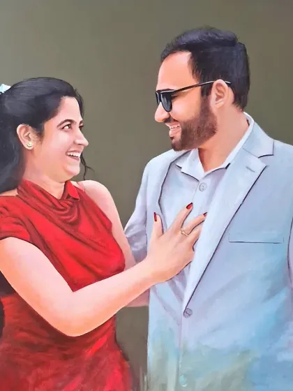 A custom portrait painting of a smiling couple. I use a soft, realistic style in my commissioned portraits to create a warm and intimate feel, perfect for capturing special relationships.
