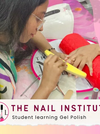 A student buffs the nail surface before applying gel polish, an important preparation step for a long-lasting manicure.