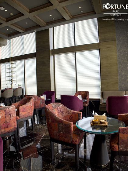 The high ceilings and large windows of Neptune create an open and airy feel, even in an intimate lounge setting.