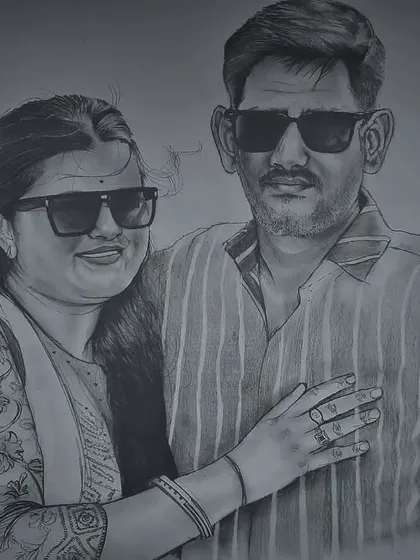 An A3 size couple portrait created with graphite pencils. This was a commission for Raksha Bandhan, designed to be a special gift celebrating a family bond.