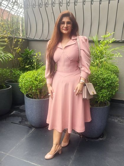 Exploring the power of pinks. This blush pink dress embodies grace and femininity, showing how color is a mood.