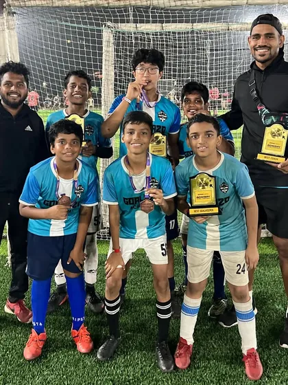 The U-13 team with their coaches and Runners-Up awards after the 'Bombay ke Champions' tournament. A fantastic achievement.
