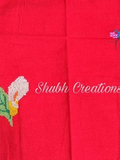 A simple yet beautiful example of cross stitch, featuring a Calla Lily flower. This technique uses X-shaped stitches to form a picture, and it's a very relaxing and meditative craft to learn.