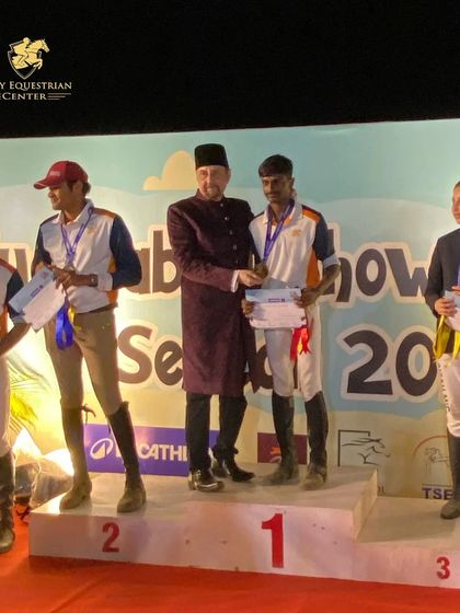 Our riders and trainers on the podium at the NASR championship. Bharath V and Ajey secured first place in their respective categories.