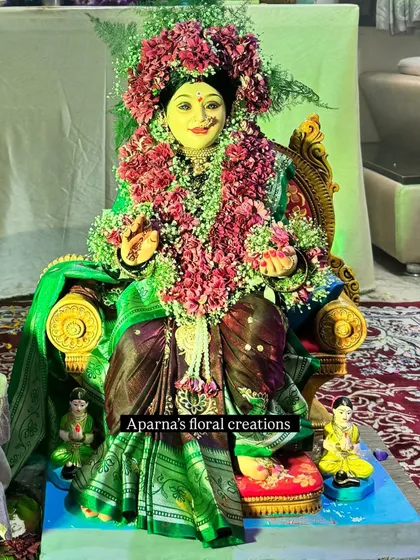 For the Gauri Pujan festival, I created this complete floral jewellery set for the Gauri idol. It includes a garland, veni, and other small adornments made from fresh pink flowers.
