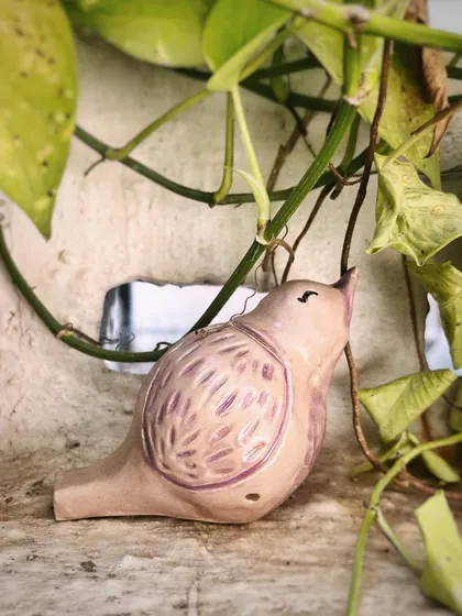 My third 'pajarito' or singing bird whistle. I wasn't sure about this dusty rose color at first, but its soft, gentle tone has really grown on me.