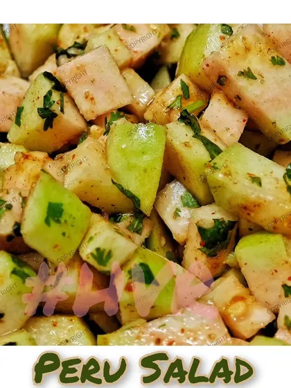 A chatpata Peru Salad made with fresh guava, spices, and herbs. A refreshing and crunchy side dish.