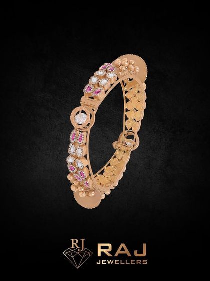 Let this bangle be a part of your story. The design features a delicate floral pattern with pink stones and polki, crafted to add a touch of elegance and glamour to your personal journey.