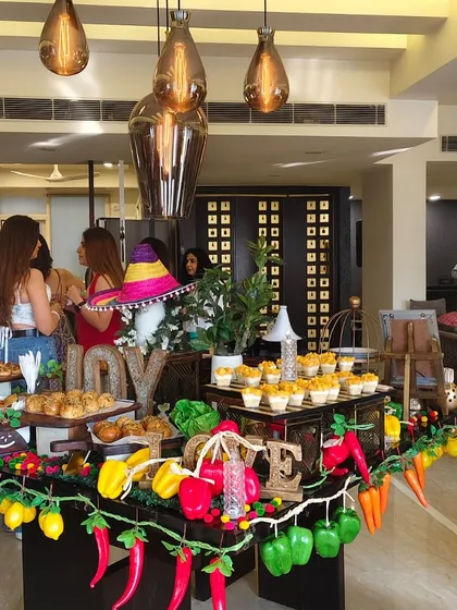Another look at our Mexican-themed party setup, showing how the food and decor come together. We provide a full experience, ensuring the ambiance matches the delicious food for a truly immersive celebration.