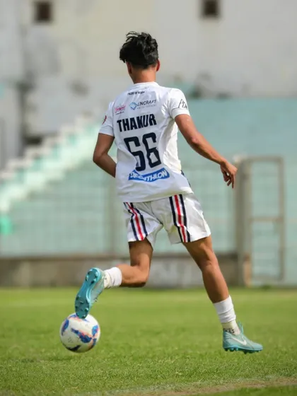 A player preparing to strike the ball, captured during our sixth league match.