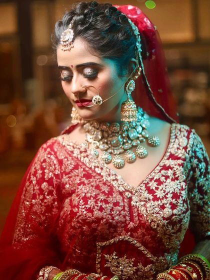 A close-up of my bride Juhi's eye makeup. The shimmery gold and black eyeshadow create a dramatic effect, perfect for a glamorous bridal look.