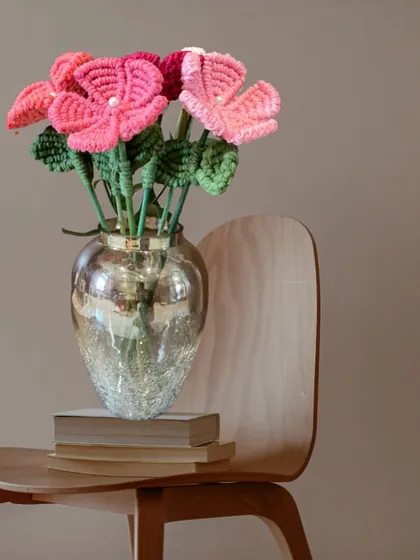 Why buy fresh flowers when you can have a bouquet that lasts forever? These macrame flower sticks are one of my favorite things to make, and they look so elegant in a vase.