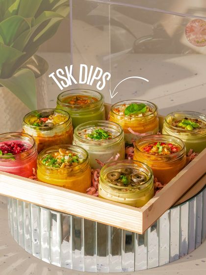 A beautiful tray of my signature dips in jars, ready for a party. This is the perfect, colourful addition to any grazing table.