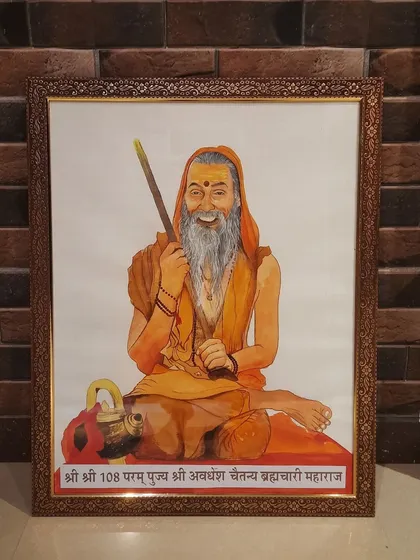 A framed watercolor painting of Guru Shri Avadhesh Chaitanya Brahmachariji Maharaj. This was a commissioned piece where I aimed to capture his joyful and serene presence.