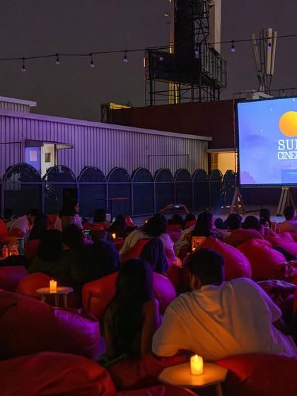 The purple ambient lighting adds to the mood at our Bangalore rooftop venue. We pay attention to every detail to ensure the atmosphere is just right.