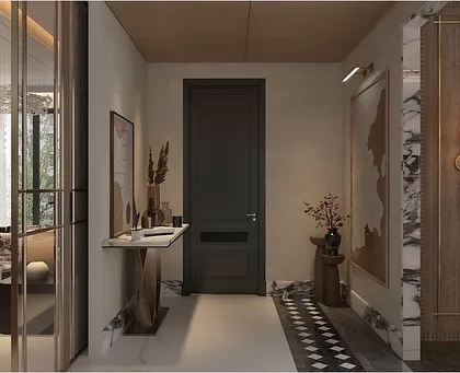 Step into the elegant foyer of this new home project. The custom-made wood door, paneled walls, and marble console table exude superior craftsmanship and a touch of opulence that elevates the entire space.