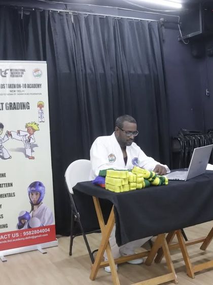 The examiner's table at our belt grading, with the new yellow belts ready to be awarded to deserving students.