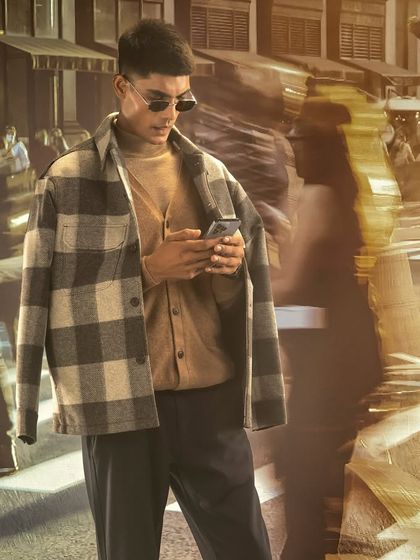 Here, the subject is perfectly integrated into a busy projected street scene. I demonstrate how to use long exposure and a focused key light to make the model stand out while the background shows motion and life.