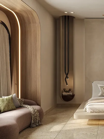 A curved, wood-paneled archway with integrated lighting creates a cozy seating nook within the bedroom. This feature adds warmth and architectural interest, contrasting with the room's otherwise raw and rustic feel.