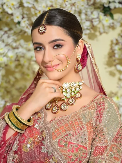 A close-up of the bride's happy expression, a testament to feeling comfortable and beautiful in her own skin on her wedding day.