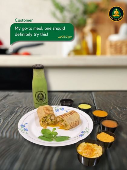 A customer favorite: my signature wrap with a side of wholesome dips and a refreshing detox juice. It's a complete, power-packed meal that customers love.